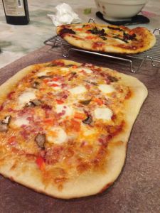 This crispy crust is slathered with tomato sauce and covered in fresh mozzarella, savory pancetta, hearty mushrooms, and crunchy peppers to make a simple and delicious dinner.  