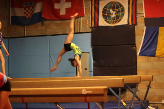 Smart practices her beam routine at practice at GymWorld in San Rafael.