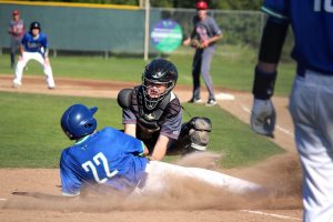 Trevor Foehr tags out Branson's Ethan Terrell in the bottom of the first. 