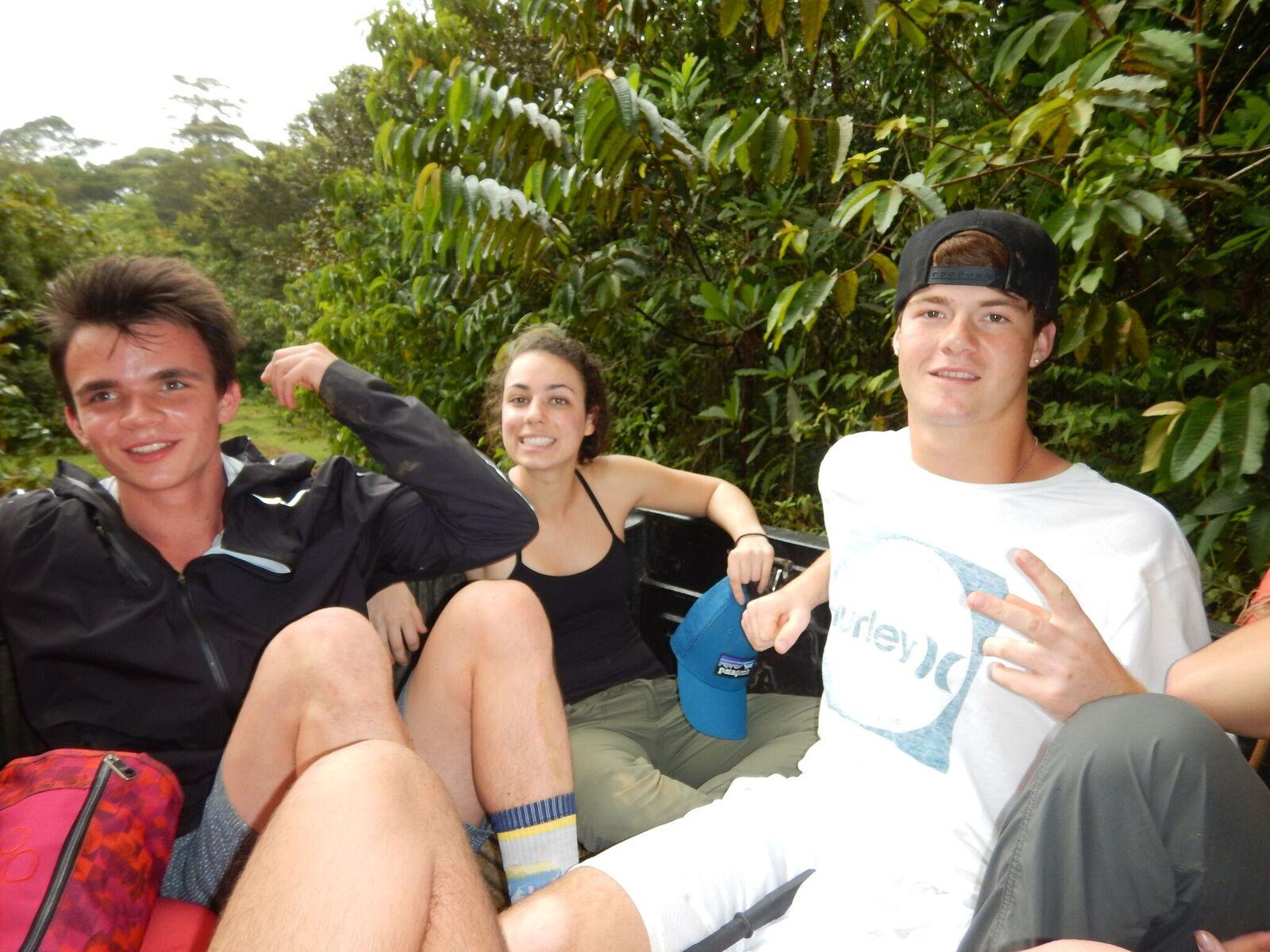 Zadoff (far left) and friends sit on the back of a truck after working in Panama