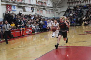 Sophomore Jenny Walker drives to the basket. 