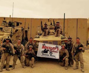 Mesker (fourth from the left) poses for a photo with his platoon while on tour in Iraq. 