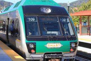 Loading its passengers, the SMART Train sits at the San Rafael Station, the end of the line
