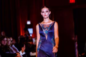 Strutting down the runway, sophomore Lyle Belger participates in her first ever fashion show season during San Francisco Fashion Community Week.