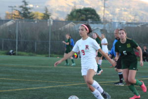 Running down the field, senior Hannah Halford scored the second goal of the game.