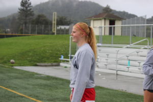 Bouton stands on the soccer field during practice.