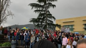 Hundreds of students crowded around the amphitheater during the 