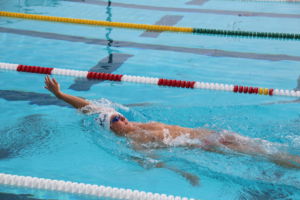 Kurakin glides through the pool in backstroke