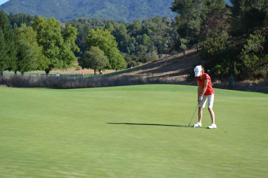 Olivia Poletti sinks a put on the first hole green during a match against drake on Tuesday, Sept. 4.