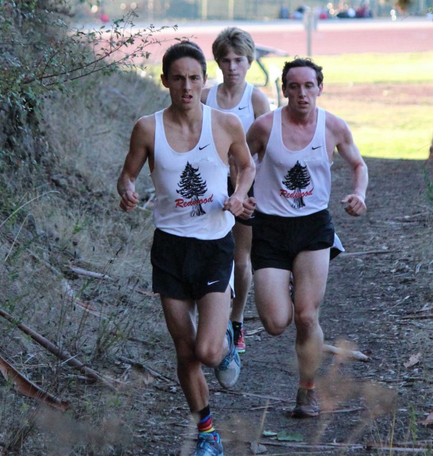Fred Huxham, junior, (front left) and freshman Andy Ehrenberg (back left), pictured here in a regular season race, were the only two members of the Redwood boys team to qualify for the state meet