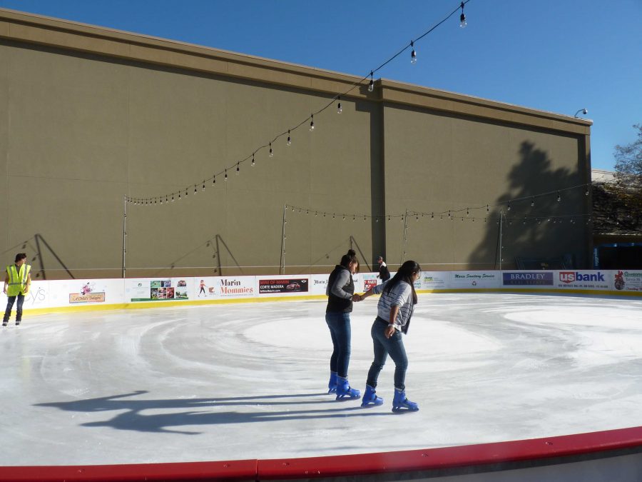 Skaters enjoy the new Northgate ice rink.