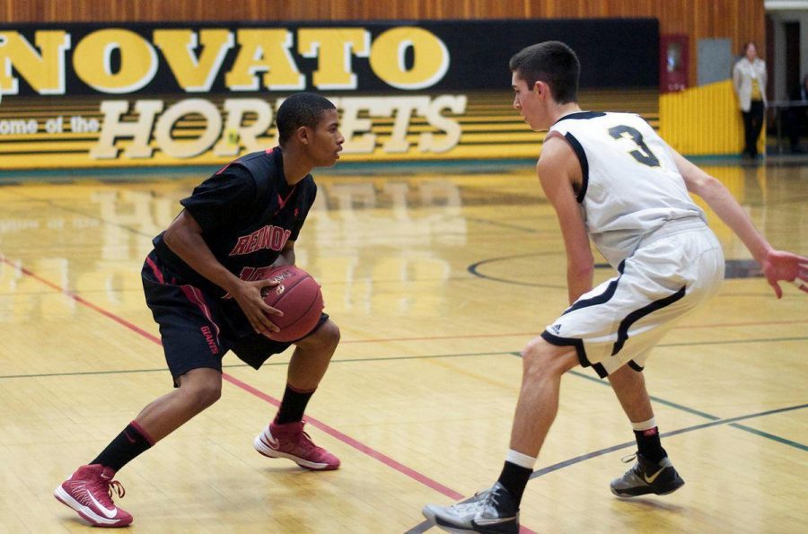 Boys varsity basketball defeats Novato 