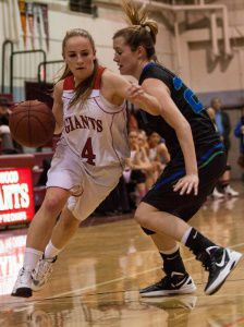 IZZY INGLEDEW DRIBBLES around a defender in a game two weeks ago against Branson.