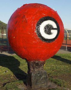 Two Redwood alumnis of 1971 recently repainted the school landmark, displaying the ball's original design.