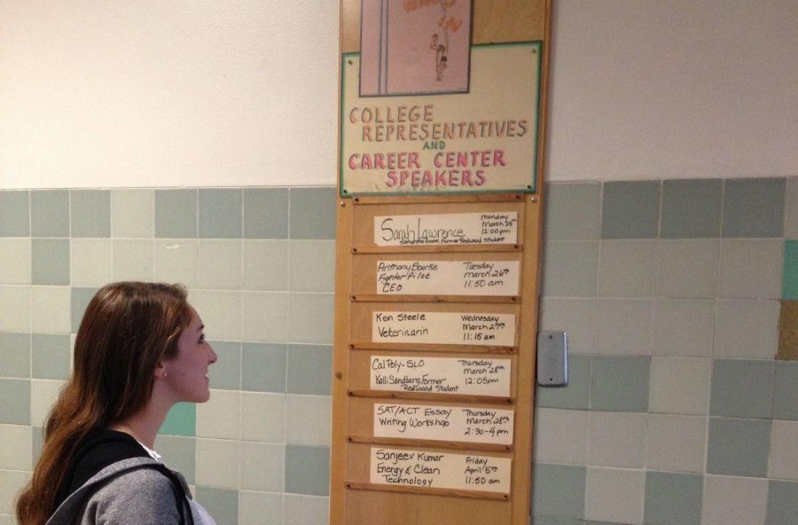 Students can see upcoming speakers posted on the wall outside the library entrance