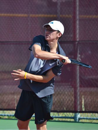 Parker Silverman swings his racket in a match against San Ramon Valley last week. Silverman won the NCS doubles two weeks ago along with Nick Barretto.