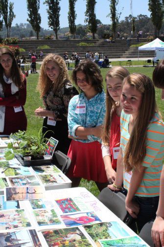 Five Drake students showcase their club at Redwood during the Sustainability Fair. The fair began with the blood drive and ended with free ice cream. 