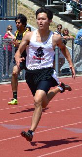 Senior Zach Cooperband closes in on the finish line in the 200m race at the MCAL track championships.