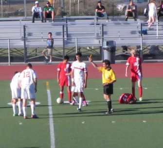 SENIOR SASHA  BOUSSINA receives a yellow card. Boussina scored a goal and assisted on another. 