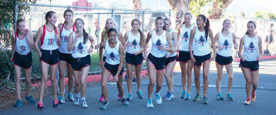 Girls’ cross country runners warm up at the October 3 meet that was relocated from Tennessee Valley to Redwood because of the government shutdown.