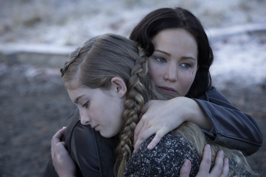 TRAUMATIZED by her experience in last years Games, Katniss Everdeen (Jennifer Lawrence), hugs her sister Primrose Everdeen (Willow Shields). Lawrence captured Katnisss emotions with just her eyes. 