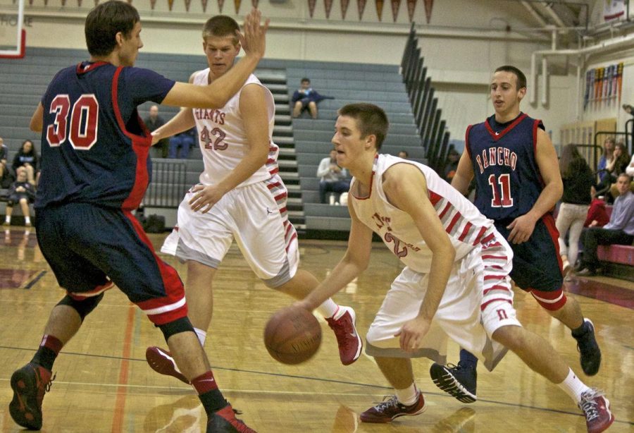 Senior Peter Kennedy uses a crossover to get past a Rancho Cotate defender.