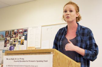 Senior Maggie Doyle performs her original poem at Poetry Slam auditions.