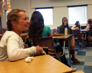 Freshman Magali de Bruyn laughs at a joke made during Body Positive Club on Tuesday.
