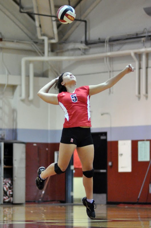 Libero jump serves the ball to opponents. 