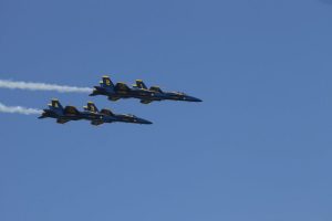 The Blue Angels fly closely packed together