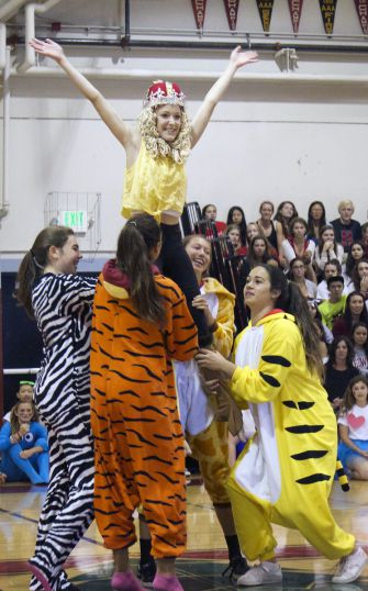 Students hold each other up during the freshman skit.