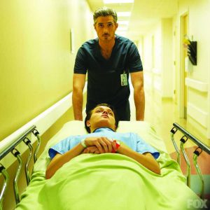 Dr. McAndrew (Dave Annable) rolls Jordi (Nolan Sotillo) to the operating room in preparation for Jordi’s leg amputation during the first episode of Fox's new show Red Band Society. 