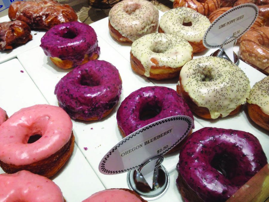 OREGON BLUEBERRY and Lemon Poppy Seed doughnuts sit on display in Johnny Doughnuts, located in downtown San Rafael.