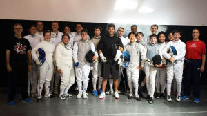 Cameron Sullivan, fourth from the left in the top row, poses with his fencing team.