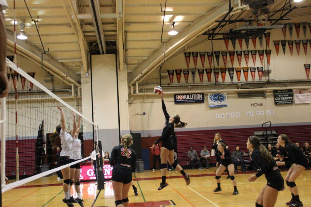 Girls varsity volleyball battles to obtain win in the state playoffs