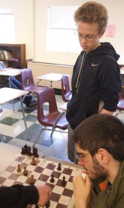 Freshman Ladia Jirasek watches over fellow Chess Club member Harry Levinson at last Thursday's meeting. Jirasek is currently ranked a Chessmaster by the United States Chess Federation.