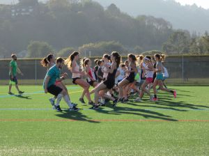 The girls' and boys' lacrosse teams do preseason conditioning together.