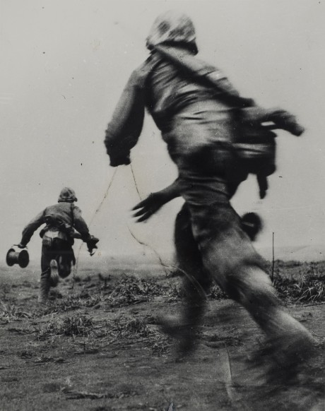 With 5th Division shows two soldiers running before detonating a bomb during World War II.