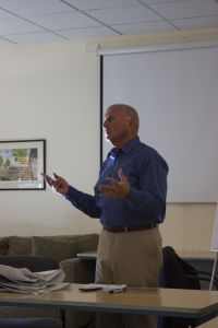 Dr. Steve Goldstone of the Cosca Group runs the meeting during SMART period on Thursday, March 19. 