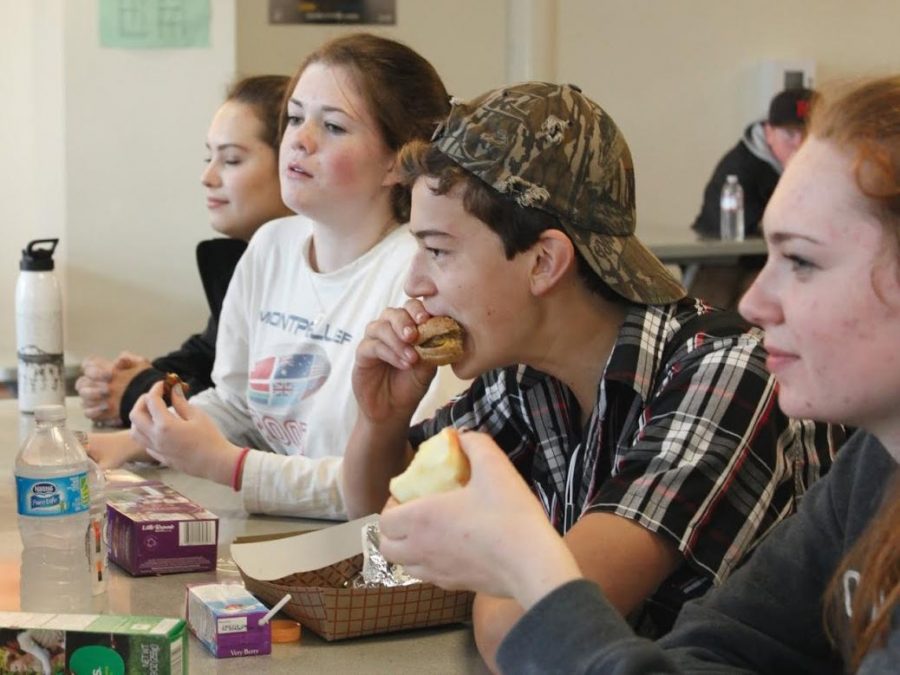 Students eat lunch in the cafeteria, which, if approved by the Redwood Foundation and Board of Trustees, will be remodeled. The changes would be implemented this summer. 