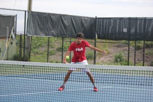 Nic Barretto practices his backhand. 