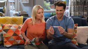 Lizzy and Luke check their  pregnancy test in NBC's new show 'One Big Happy.'
