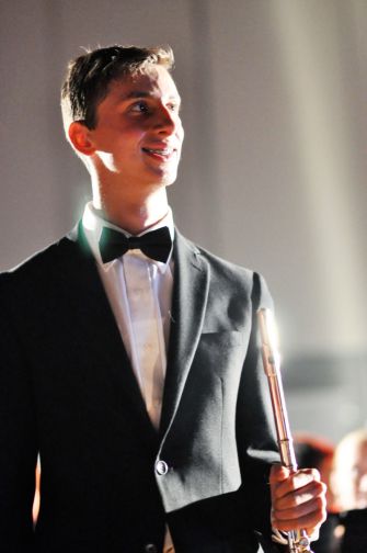 Jeremy Goldwasser holds his flute proudly after performing his concerto. 