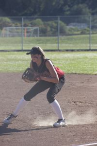 Junior Kayla Rose works on fielding during practice.