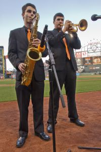 Juniors Michael Schwartz (left) and Jason Seavey perform the national anthem in front of more than 40,000 people last Friday at AT&T Park.