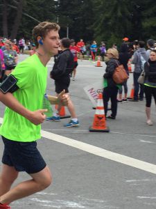 Nearing the finish line, senior Cole Schneider preservers, about to fulfill his uncle's dare. 