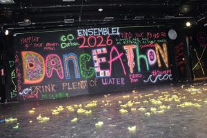 This year's Dance-a-Thon art displayed on the walls in the Little Theater. 