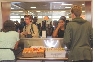 Students line up outside the CEA window to order the new non-GMO and organic food items during lunch.