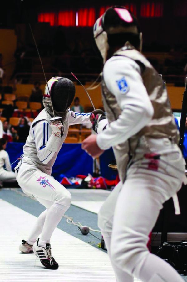 Fencing with his opponent, sophomore Sebastian Medloff competes in matches across the country.