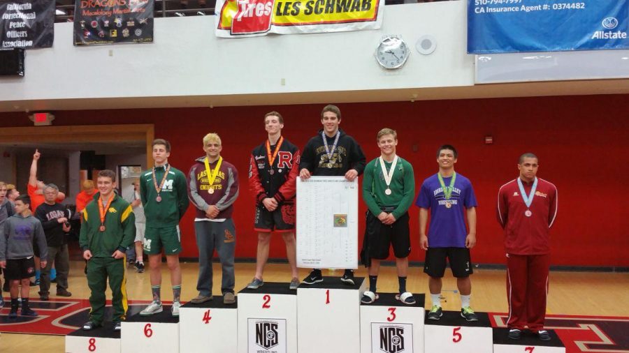 Standing atop the podium, senior Riley Dow takes in the moment after placing second in the NCS tournament. This win sent him to the CIF state tournament, where he was defeated by the fifth-ranked wrestler in California.
